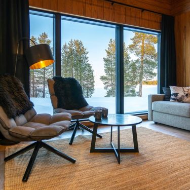 Log cabin accommodation at Wilderness Hotel Inari in Finnish Lapland